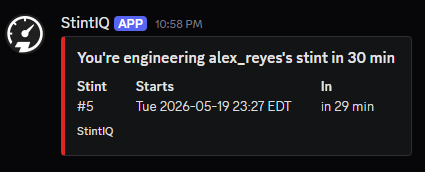 A Discord DM from the StintIQ bot showing the engineer-flavored T-30 stint reminder, labeled "You're engineering [driver's name]'s stint in 30 min."